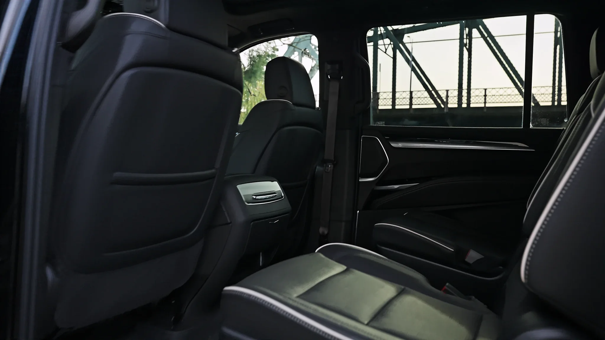 Rear cabin of the Cadillac Escalade ESV: leather seats and a clear centre aisle